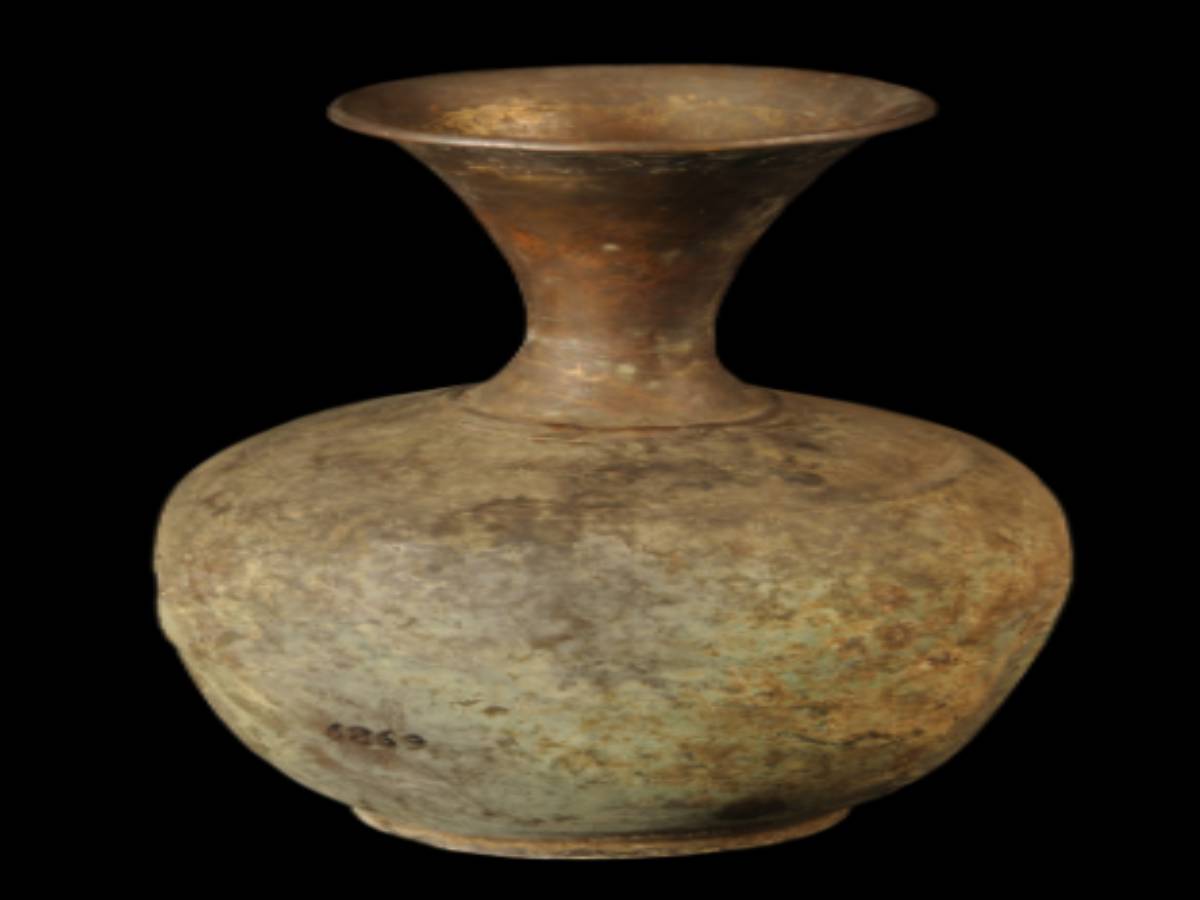Brass water vessel with a conical upper part