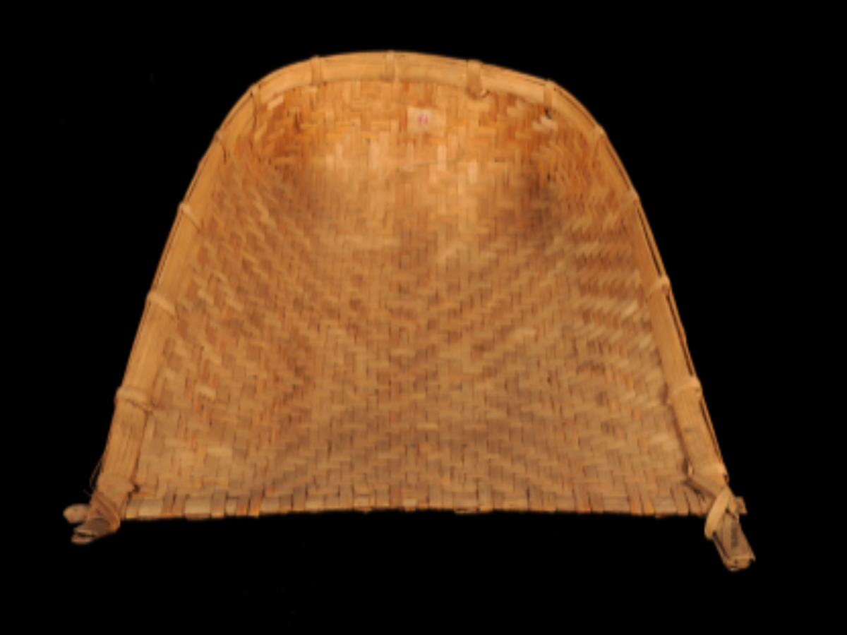 A traditional bamboo winnowing fan (Tichak) A traditional bamboo winnowing fan (Tichak)