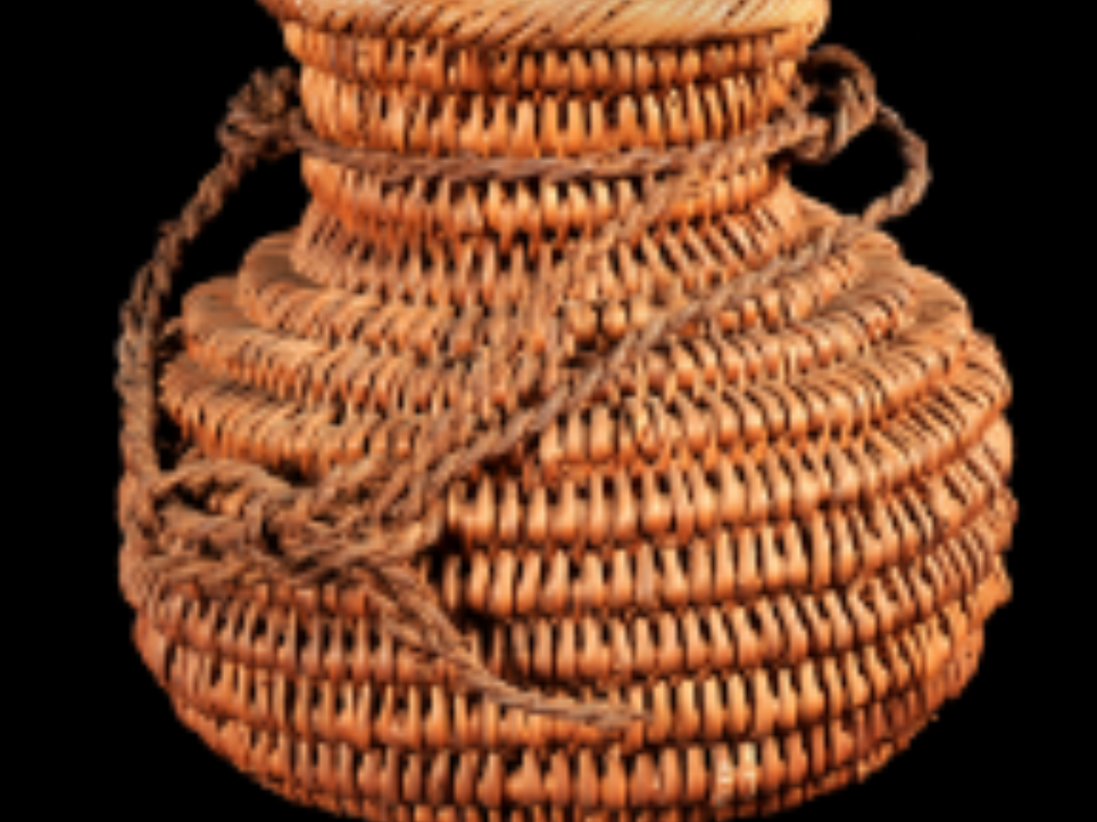 Plaited bark fibre cane basket Plaited bark fibre cane basket