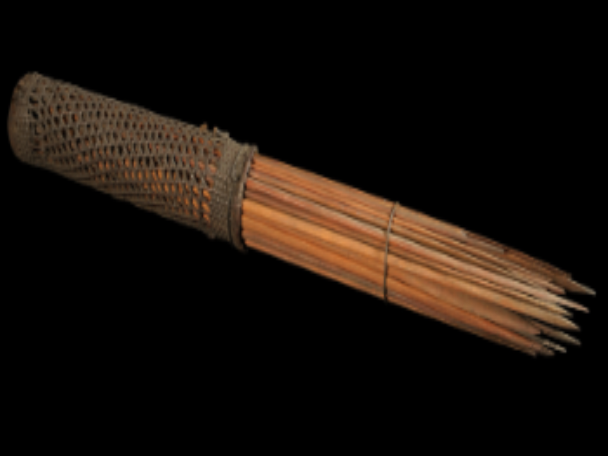 Bamboo Arrows in Woven Cane Quiver Bamboo Arrows in Woven Cane Quiver