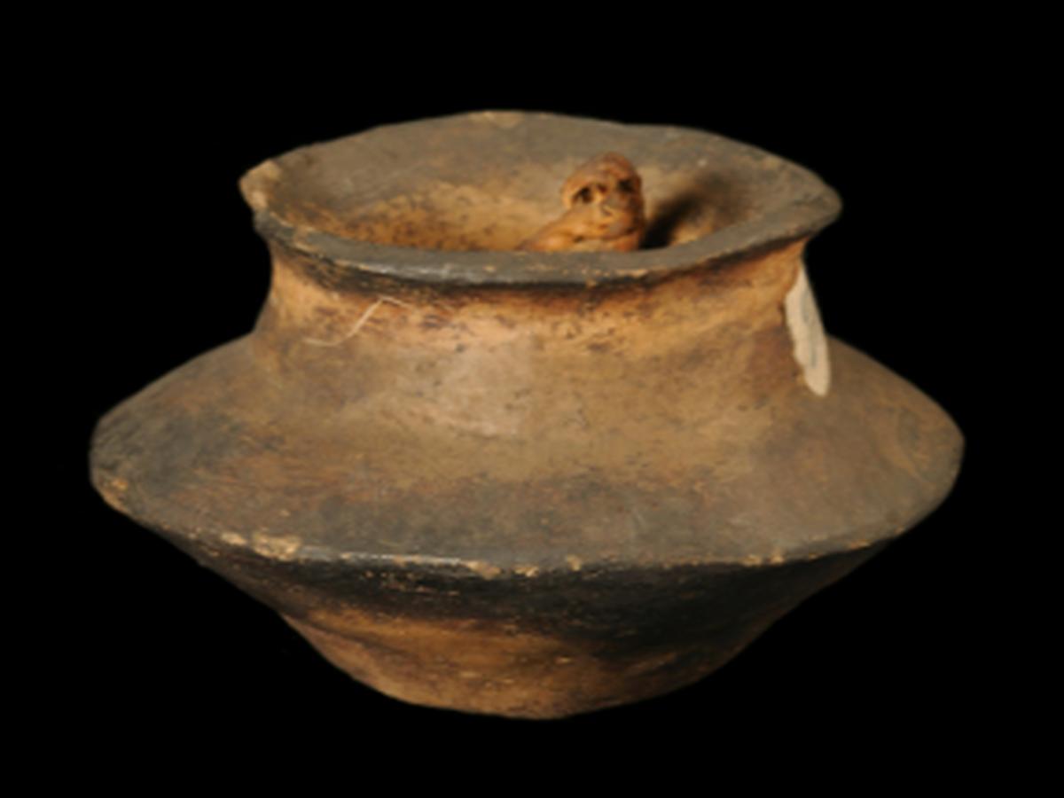 Traditional Earthen Pot of Khampti Tribe Traditional Earthen Pot of Khampti Tribe