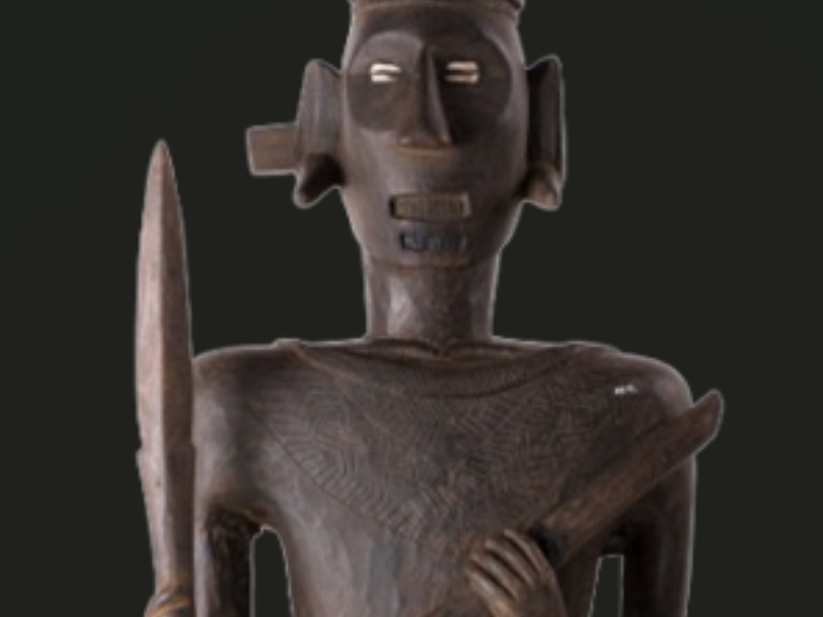 A Wooden Warrior of the Konyak Tribe A Wooden Warrior of the Konyak Tribe