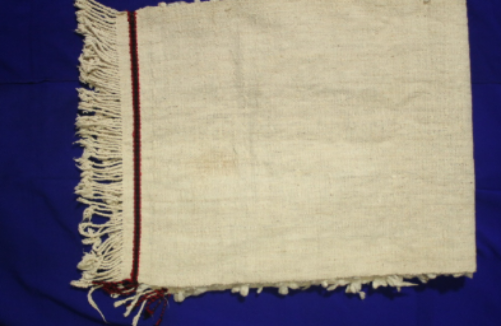 Nyethow-nyeesa (ceremonial dress), made of indigenous cotton. Nyethow-nyeesa (ceremonial dress), made of indigenous cotton.
