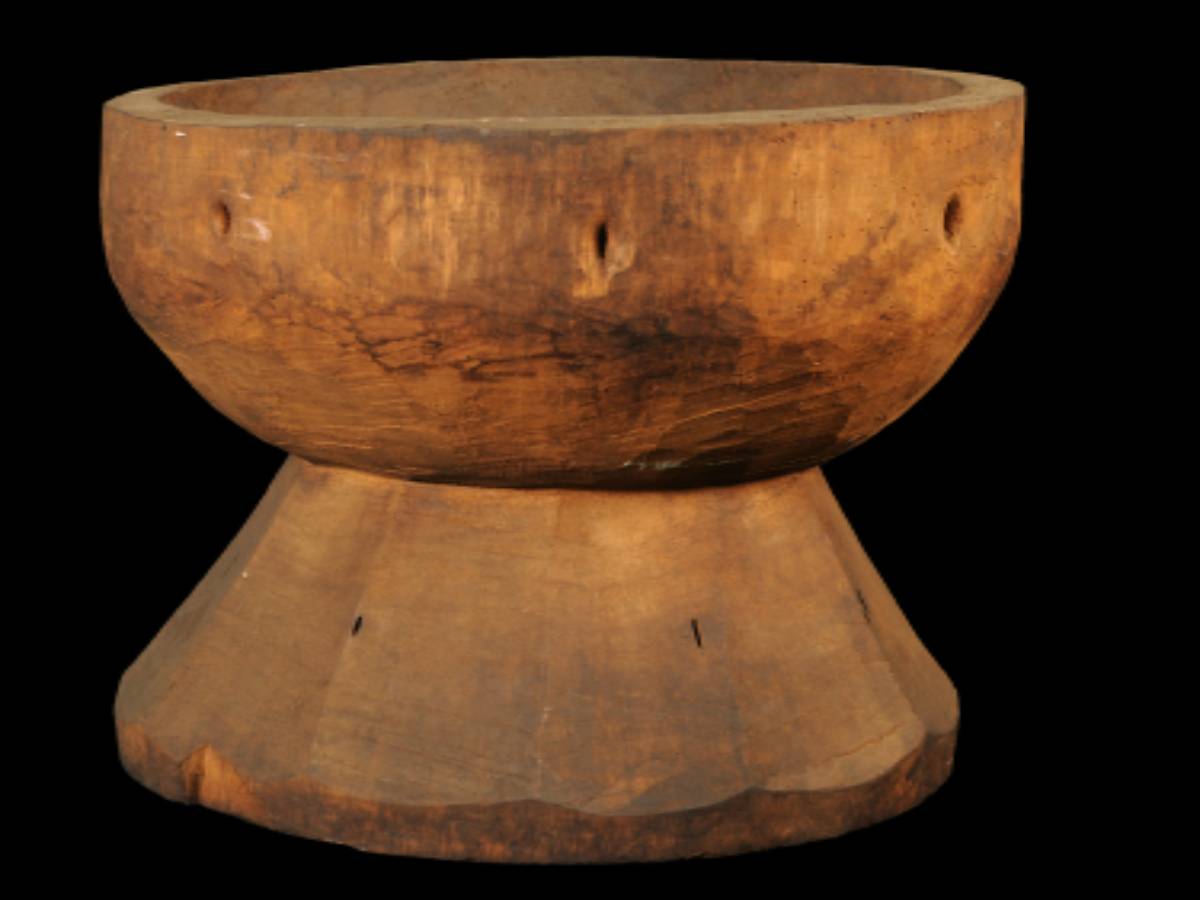 Dumbbell-Shaped Wooden Vessel of rabha tribe Dumbbell-Shaped Wooden Vessel of rabha tribe