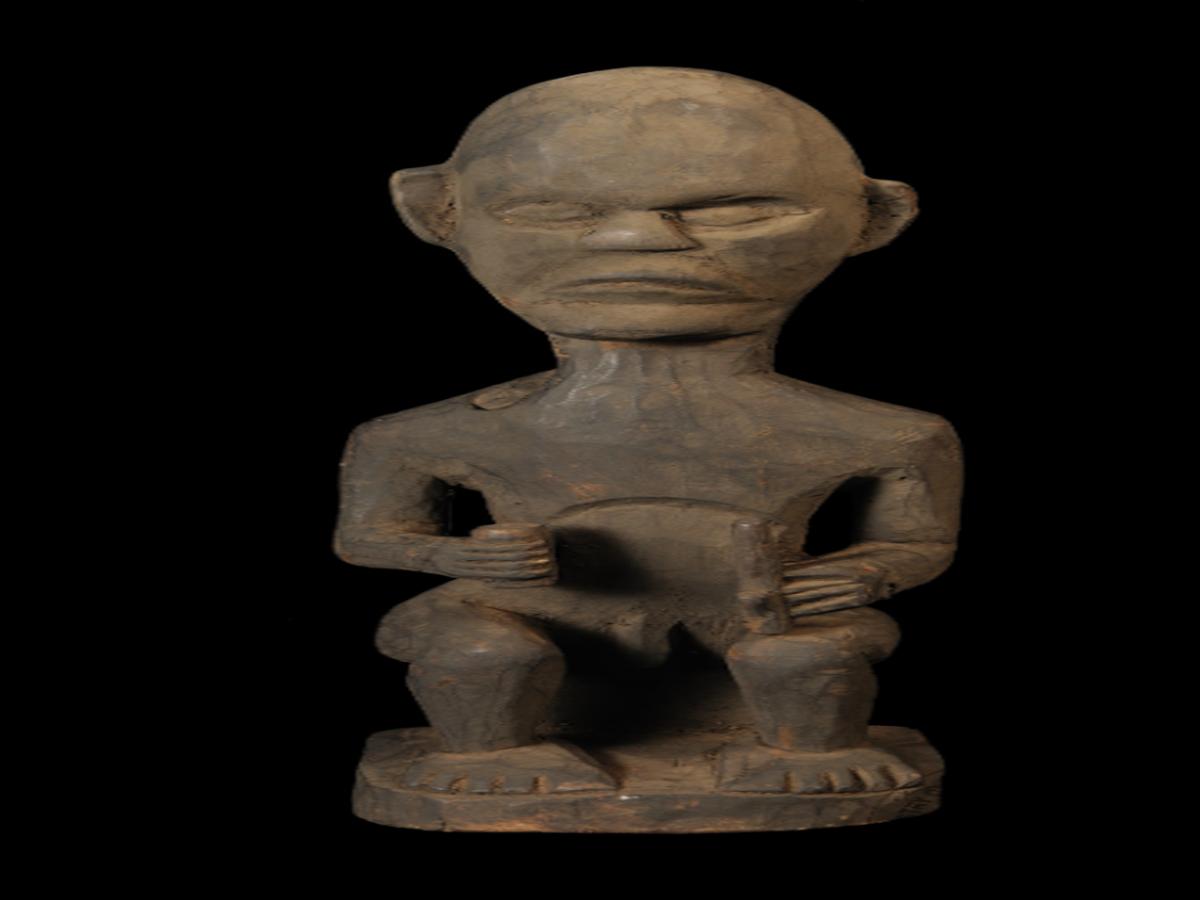 Wooden Statue of a Konyak Naga Wooden Statue of a Konyak Naga